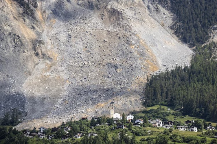 Close Call: Massive Rockslide Narrowly Misses Swiss Village